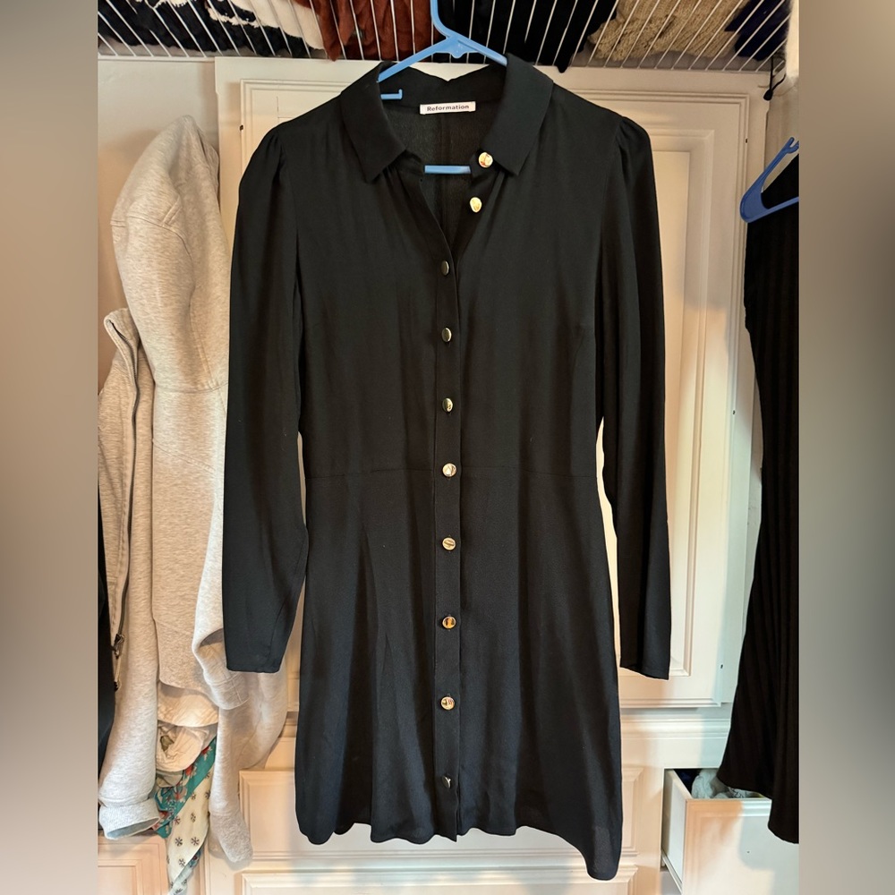 Reformation black button up dress. Size 6, never worn.
